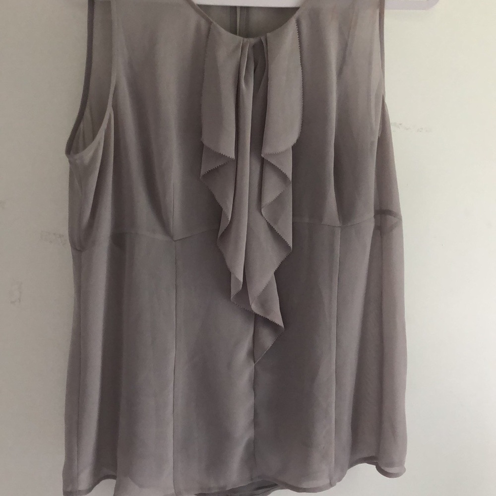 Lovely dressy light weight sleeveless blouse